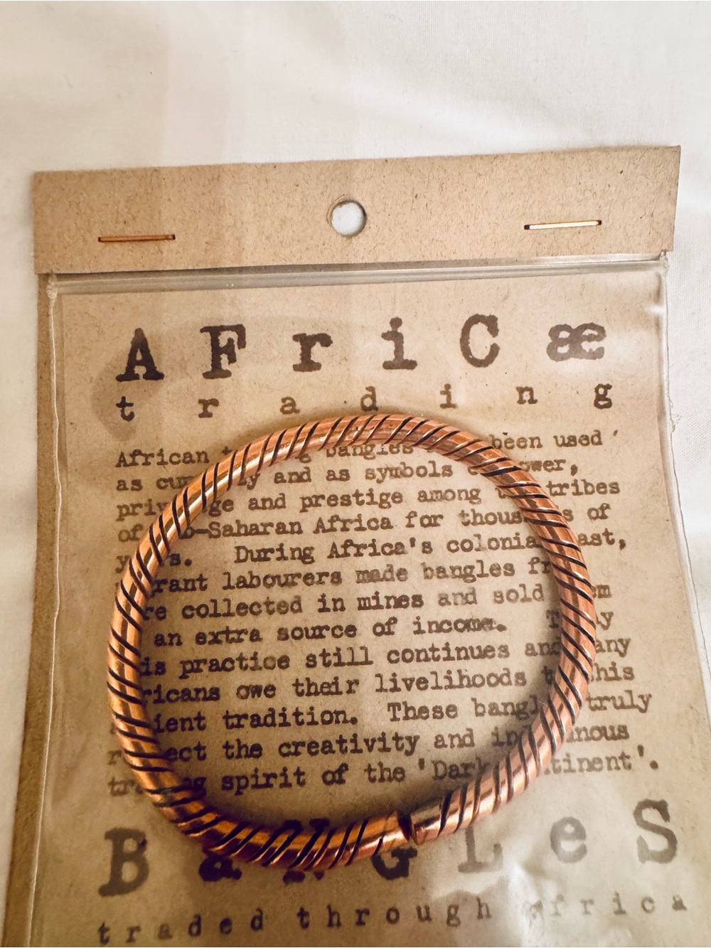 African trading copper colored bangle. OS. Purchased in South Africa. NWT.